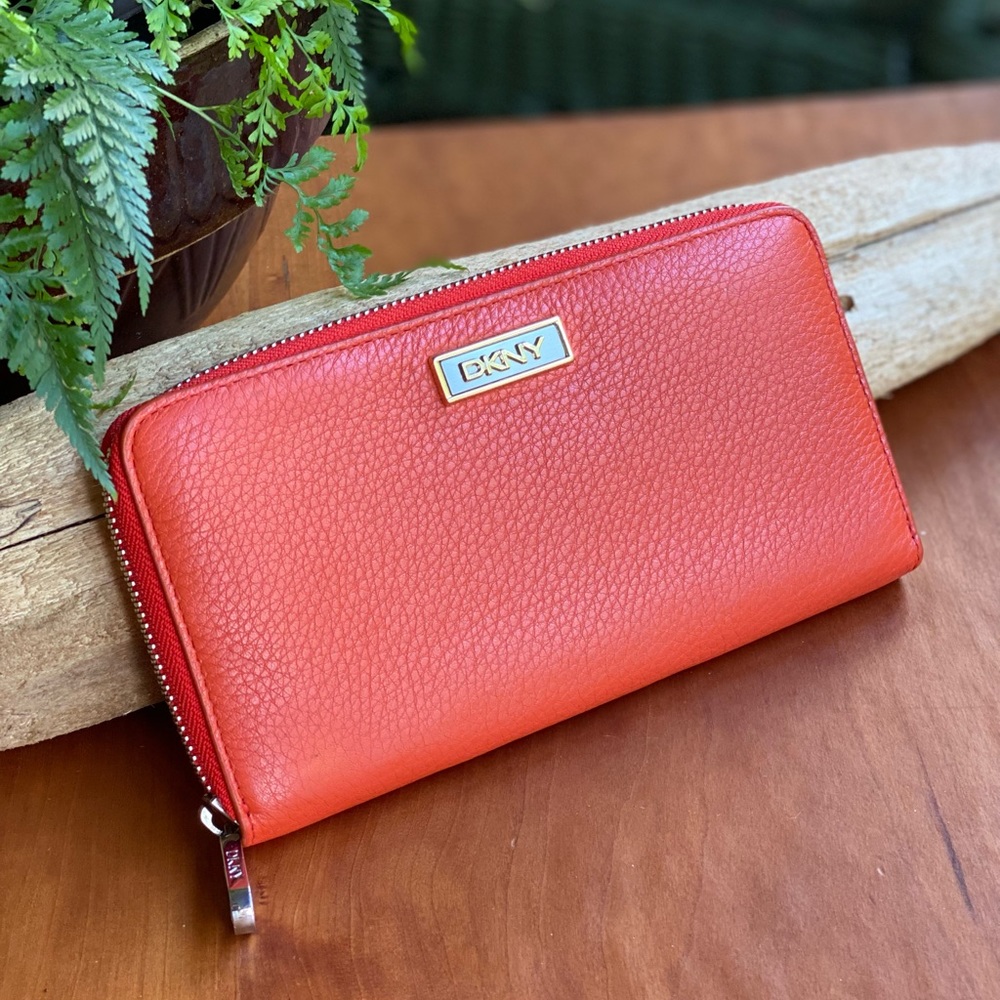 DKNY orange leather zip around wallet